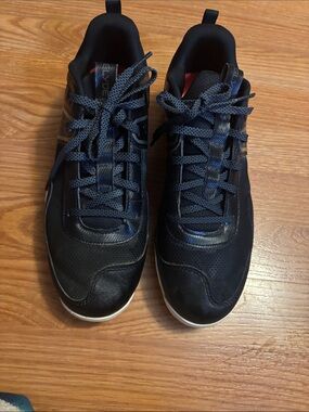 Under Armour, riven  sisterhood, cleats, size 10 black in color